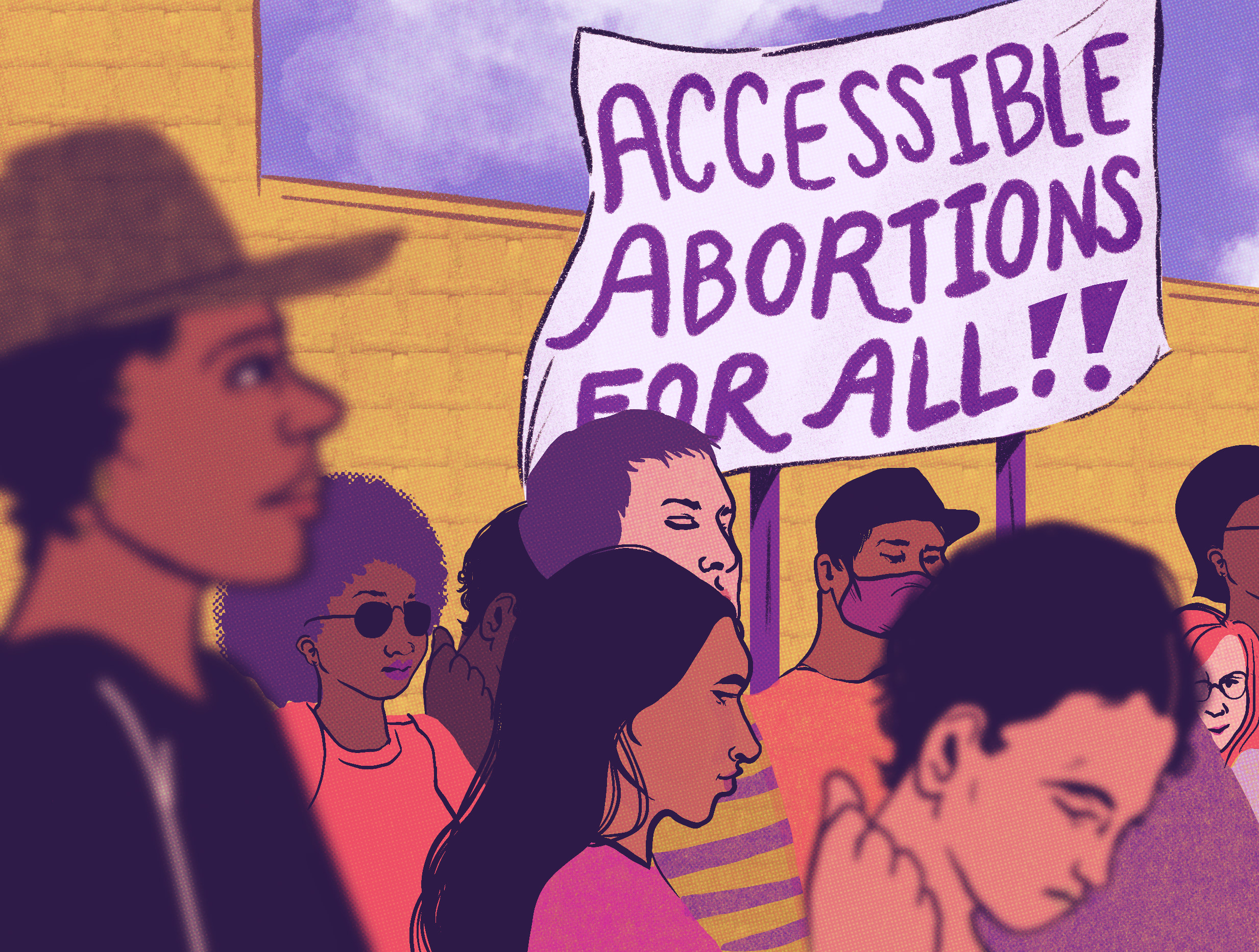 A group of pro-abortion activists are at a protest holding a large sign that says Accessible abortions for all.